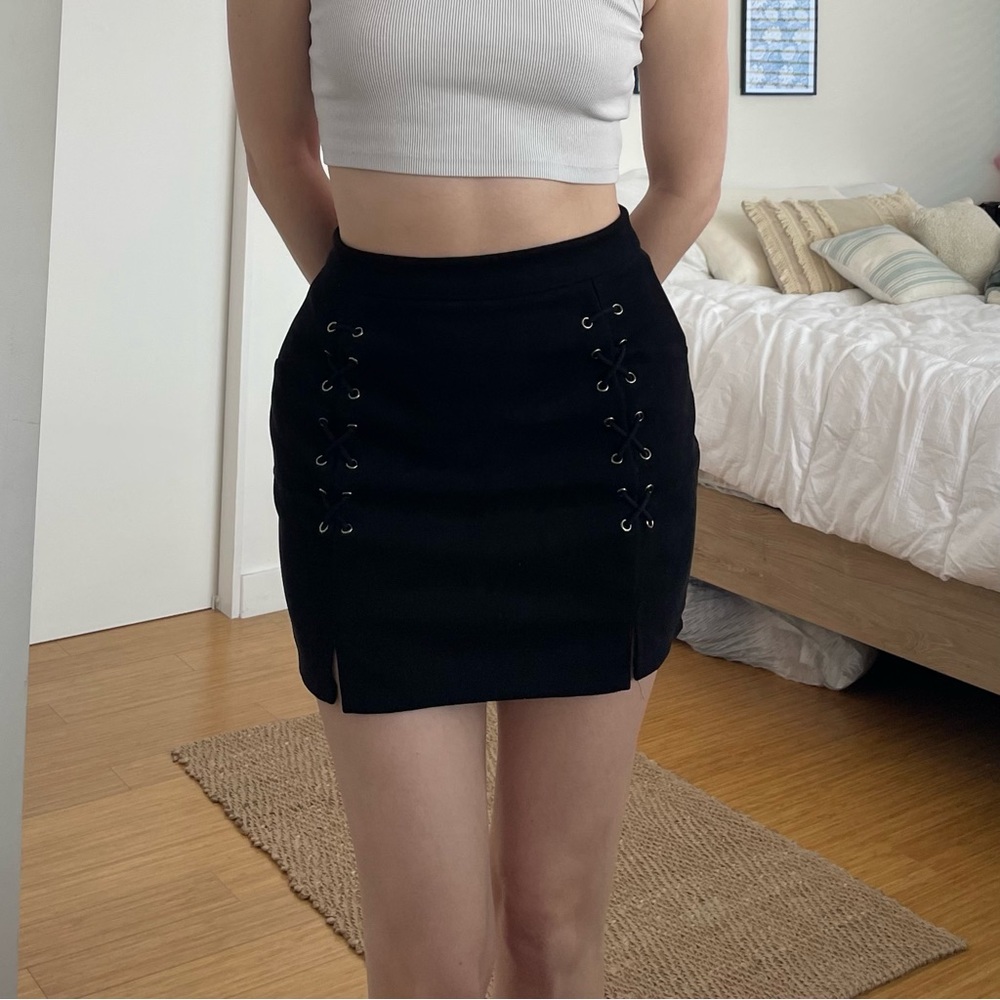 black criss cross mini skirt
